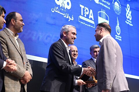 Honoring the CEO of the National Copper Company at the 